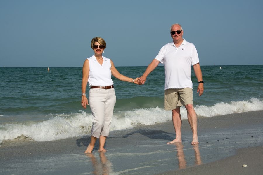anniversary couple walking on Indian Rocks Beach
